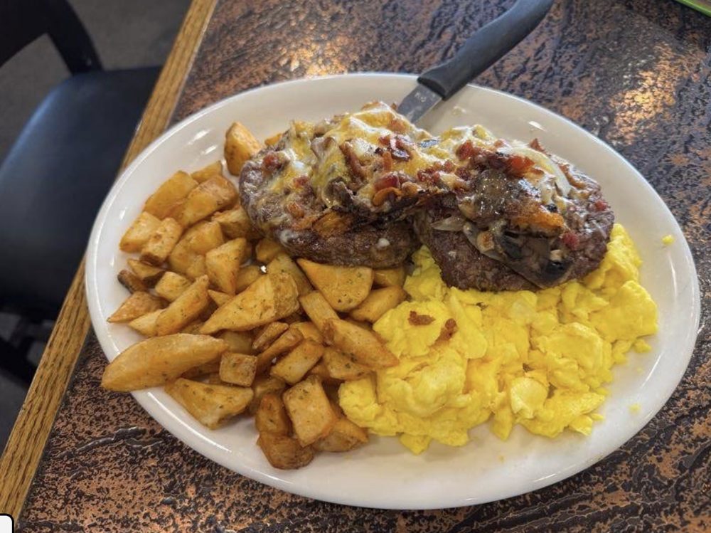 Steak and eggs with seasoned potatoes